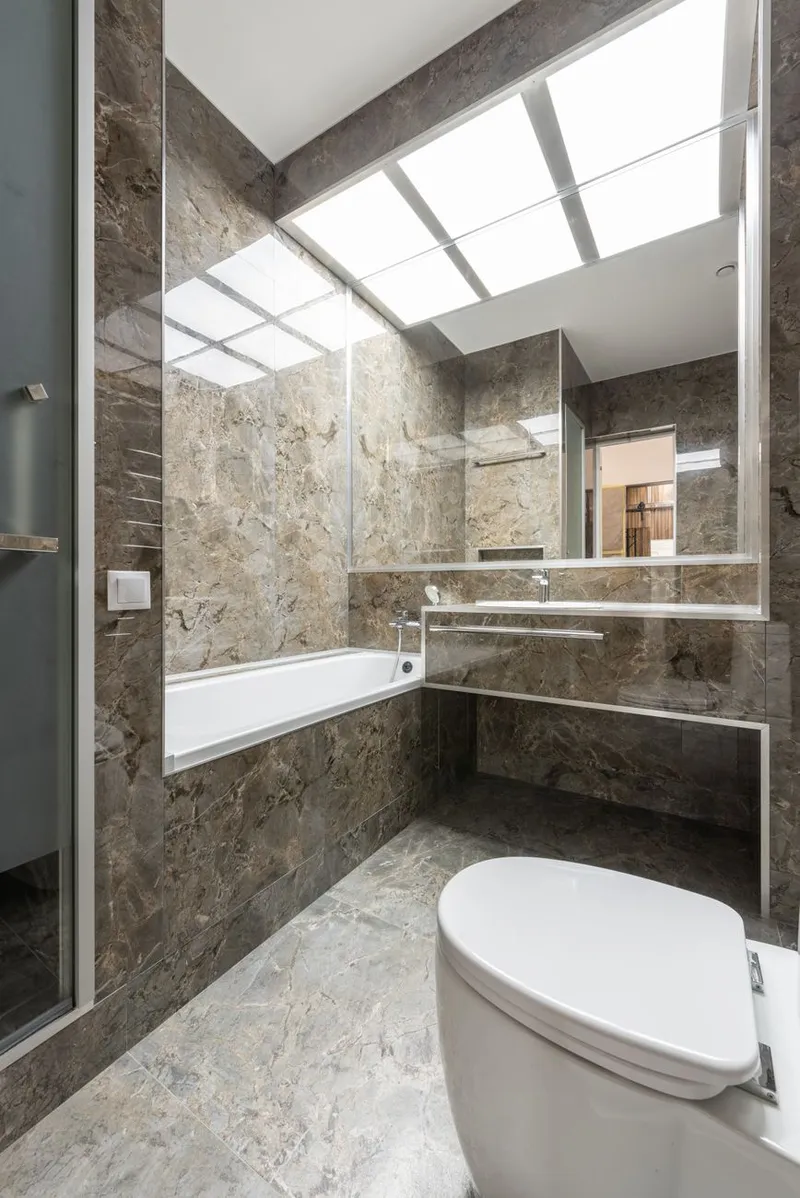 Sleek marble-tiled bathroom